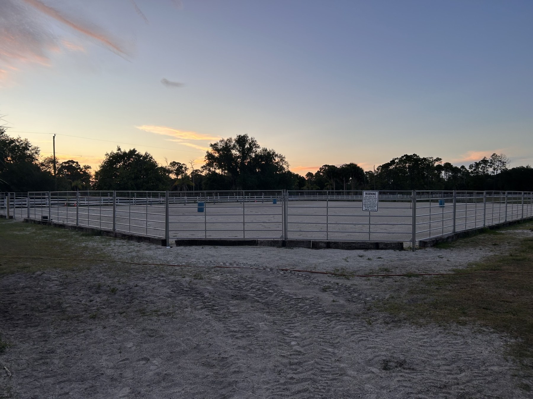Riverwind Ranch arena at sunset