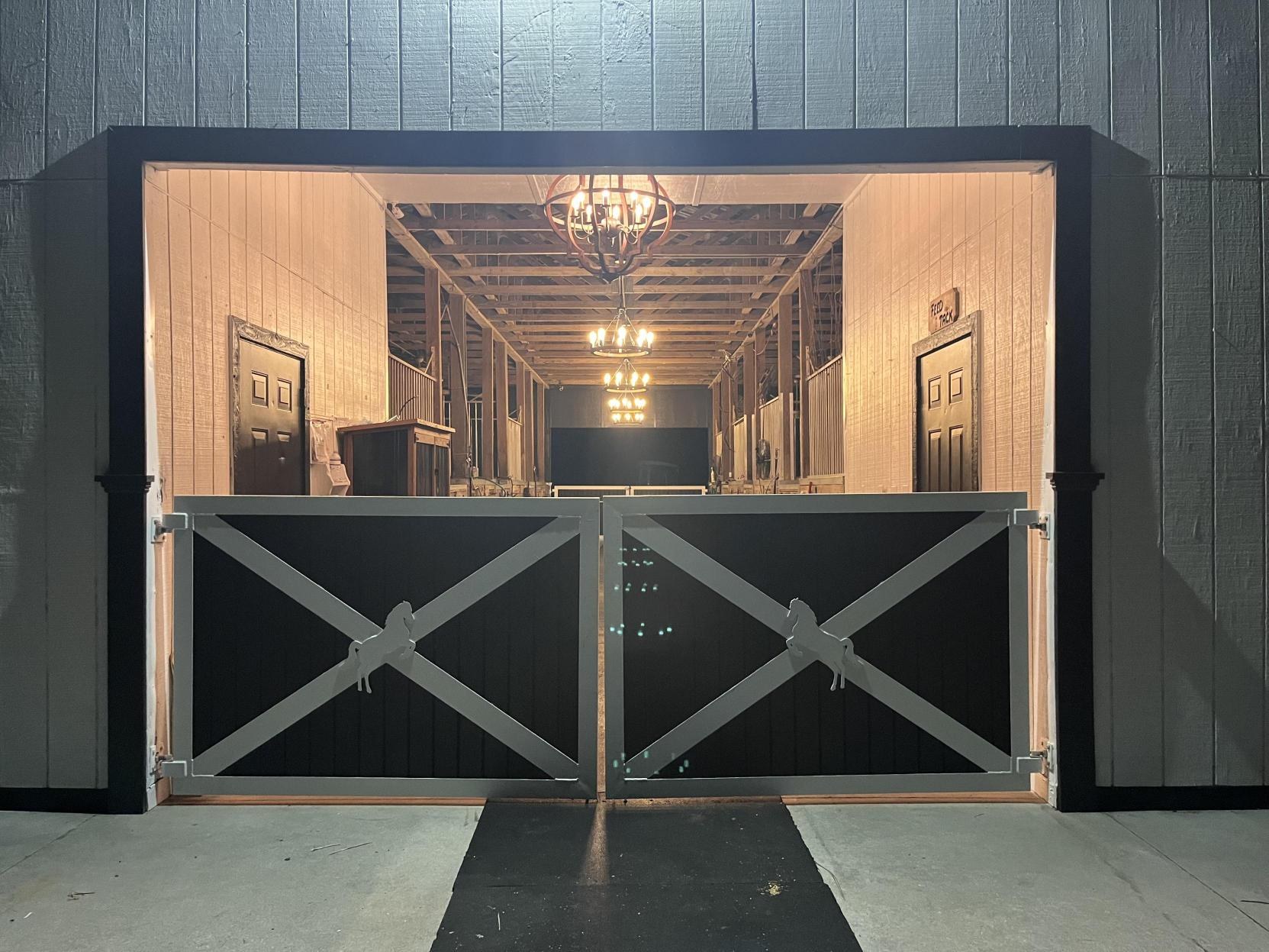 Riverwind Ranch barn entrance at night