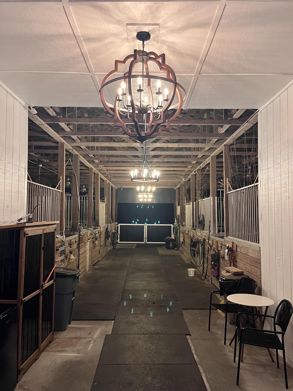 Custom barn interior with chandeliers